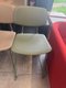 Chaise hauteur 65 cm assise revêtement PVC couleur kaki piétement vert kaki