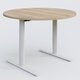 Table ronde gamme Pure diametre 110 cm. Plateau Chêne naturel et pietement Blanc.