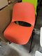 Chaise visiteur coque polypropyène orange structure 4 pieds noir