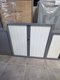 Armoire à rdieaux 120 x 120 cm coffre couleur aluminium et rideaux blanc