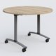 Table ronde gamme Arca D110 cm. Plateau Chêne naturel et pietement Aluminium.