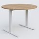 Table ronde gamme Pure diametre 110 cm. Plateau Noyer et pietement Blanc.